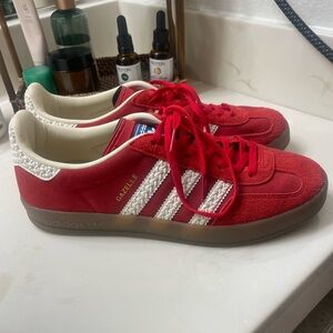 Red adidas gazelle